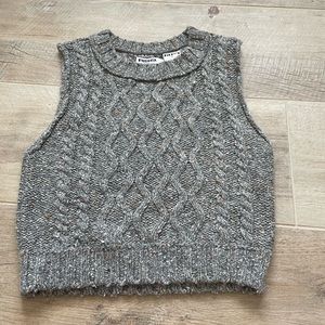 grey sweater vest